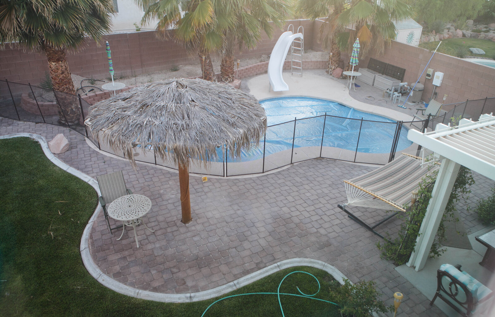 Backyard pool neatly covered and closed for the season